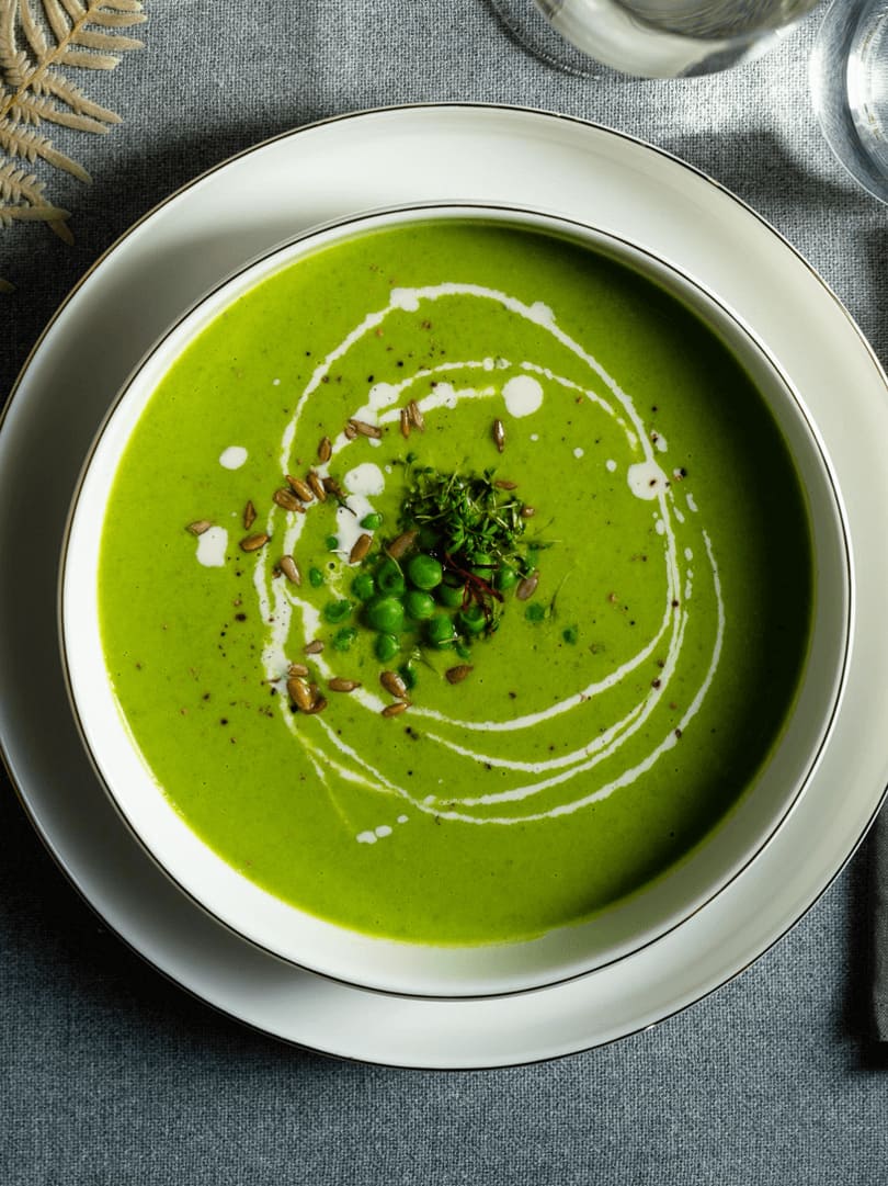 Vegan pea soup with saffron and roasted sunflower seeds